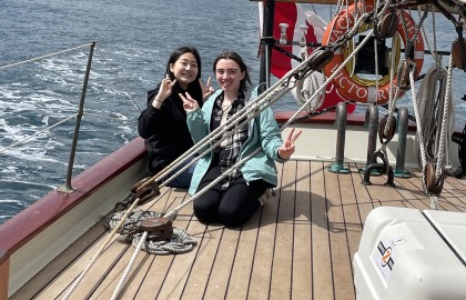 Trainees from a school group trip in 2022 enjoying community on the new aft deck