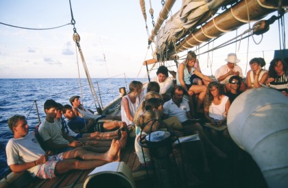 Trainees from the Pacific Swift's first offshore voyage in 1988/1989 enjoying community on the aft-deck.